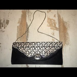 Classy black satin with rhinestone trim and clasp